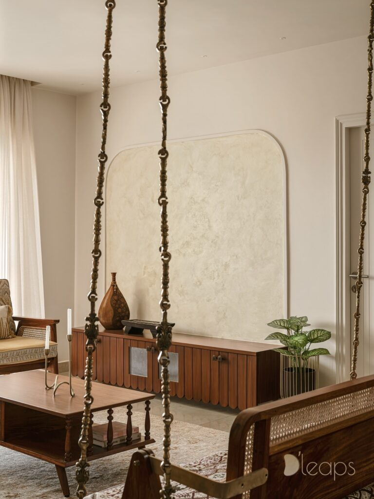 Living room with lime plaster arch and scalloped teak console, D'leaps Hyderabad
