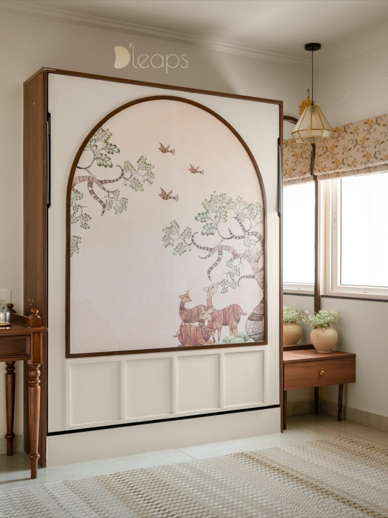 Hand-painted Pichwai mural on a folding wall bed